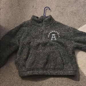 Aeropostale women’s fluffy grey pull over. Never worn before, and super stylish.